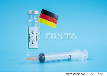 COVID-19 Vaccine vial, injection Needle Syringe and German flag against Coronavirus infection in hospital laboratory. Medical, health, Vaccination and immunization concept COVID-19 Vaccine vial, injection Needle Syringe and German flag against Coronavirus infection in hospital laboratory. Medical, health, Vaccination and immunization concept 72067768