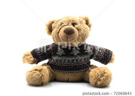 Closeup of traditional teddy bear sitting on white background Closeup of traditional teddy bear sitting on white background 72068641