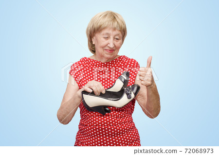 New shoes. Senior woman and shopping. New shoes. Senior woman and shopping. 72068973