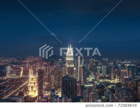 Petronas Towers, colorful vibrant twilight after sunset. Petronas Towers, colorful vibrant twilight after sunset. 72069659