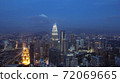 Petronas Towers, colorful vibrant twilight after sunset. 72069665