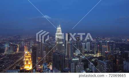 Petronas Towers, colorful vibrant twilight after sunset. Petronas Towers, colorful vibrant twilight after sunset. 72069665