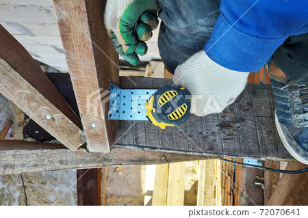 master screwdriver screwdriver screw into a wooden board 72070641