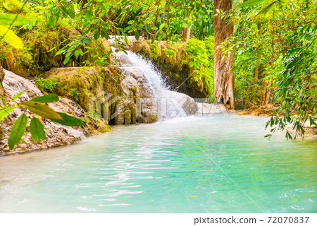 Beautiful waterfall in wild rainforest in Erawan National park, Thailand Beautiful waterfall in wild rainforest in Erawan National park, Thailand 72070837