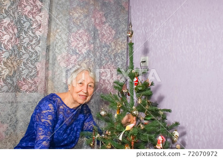 A portrait of senior woman on Christmas day 72070972