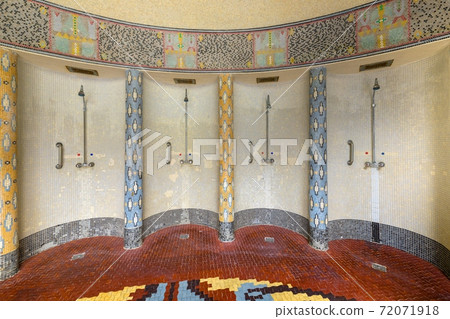 Colorful and ornate Shower cabins in bath house Colorful and ornate Shower cabins in bath house 72071918