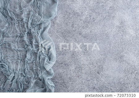 Gauze on concrete with copy space 72073310