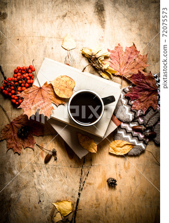 Autumn style. Coffee with an old books. Autumn style. Coffee with an old books. 72075573