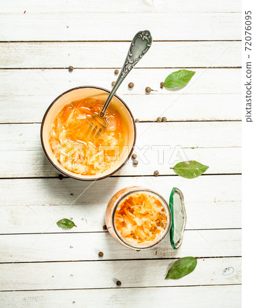 Pickled cabbage in a bowl. Pickled cabbage in a bowl. 72076095
