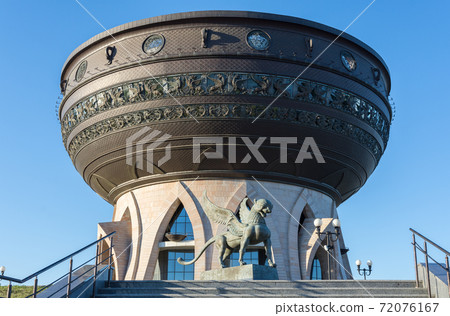 view of the building in the form of Kazan, photo was taken on a sunny summer day. 72076167