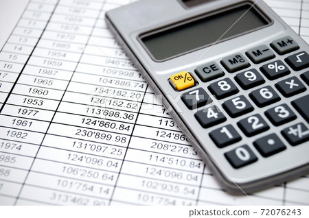 Calculator on documents. Calculator on documents. 72076243