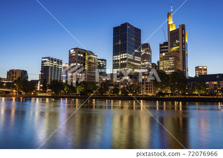 Modern panorama of Frankfurt at evening 72076966