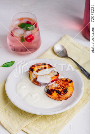 Oven Roasted Peaches with Honey Oven Roasted Peaches with Honey 72078223