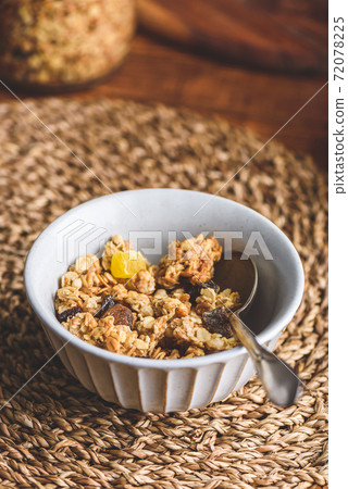 Bowl with Granola and Dried Fruits Bowl with Granola and Dried Fruits 72078225