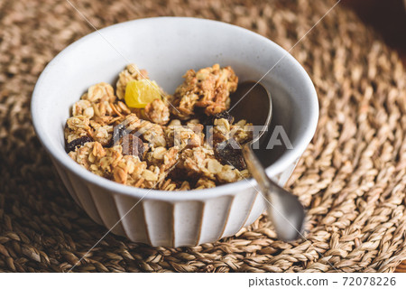 Bowl with Granola and Dried Fruits Bowl with Granola and Dried Fruits 72078226