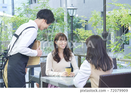 Woman sitting on the terrace Woman sitting on the terrace 72079909