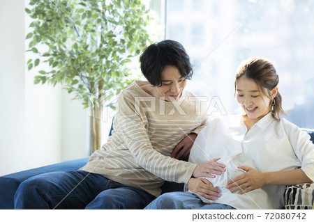Touching a couple, pregnant woman, stomach 72080742