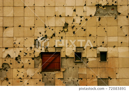 Bullet holes left on the walls of the Sarajevo building 72083891