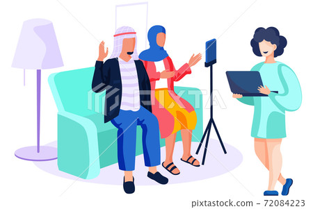 People of arab nationality give interviews on camera. Woman with laptop in hands is smiling People of arab nationality give interviews on camera. Woman with laptop in hands is smiling 72084223