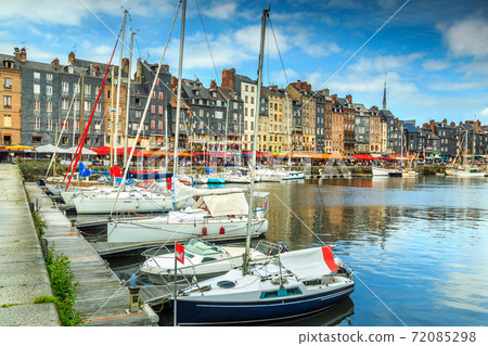 Traditional houses and boats in the old harbor,Honfleur,France 72085298