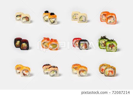 Large set of different types of maki sushi on a neutral light background 72087214