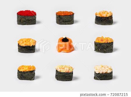 Set of different types of sushi gunkans on a neutral white background. Caviar, fish and seafood wrapped in nori. Set of different types of sushi gunkans on a neutral white background. Caviar, fish and seafood wrapped in nori. 72087215