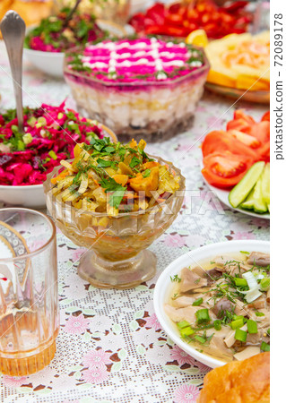 Salads and side dishes in plates on the table Salads and side dishes in plates on the table 72089178
