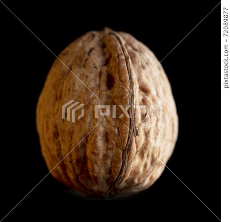 Walnut isolated on black background. 72089877