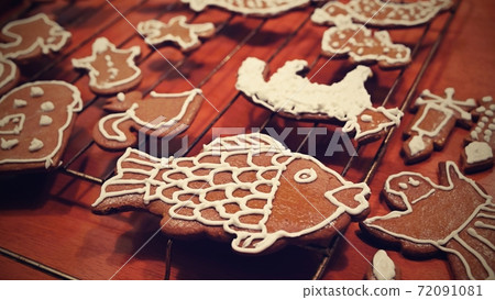 Christmas homemade gingerbread cookies. Festive concept with baking on Christmas time. Christmas homemade gingerbread cookies. Festive concept with baking on Christmas time. 72091081