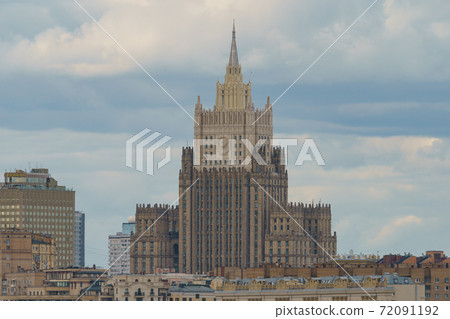 Moscow cityscape within day time. Offices buildings exterior. Rooftops of residential houses. Cloudy sky. Overcast day. High angle view.. Ministry of Foreign Affairs Moscow cityscape within day time. Offices buildings exterior. Rooftops of residential houses. Cloudy sky. Overcast day. High angle view.. Ministry of Foreign Affairs 72091192
