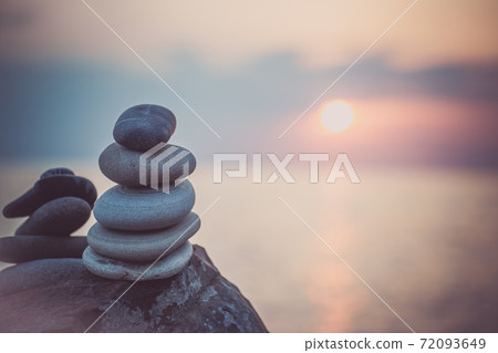 Stones pyramid on sand symbolizing zen, harmony, Stones pyramid on sand symbolizing zen, harmony, 72093649