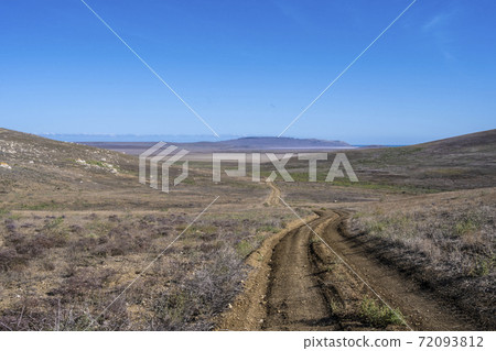 Fields and hills in the Opuksky nature reserve in the Republic of Crimea, Russia. Clear Sunny day October 7, 2020 Fields and hills in the Opuksky nature reserve in the Republic of Crimea, Russia. Clear Sunny day October 7, 2020 72093812