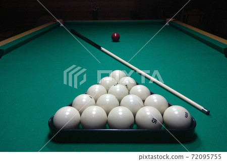Billiard table and cue with white balls Billiard table and cue with white balls 72095755