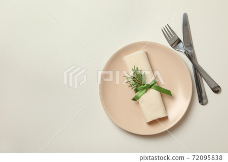Concept of New year table setting on white background 72095838