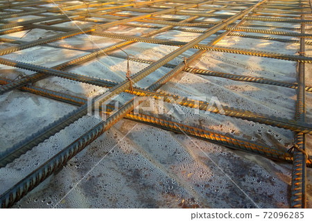 Construction workers fabricating steel reinforcement bar at the construction site Construction workers fabricating steel reinforcement bar at the construction site 72096285
