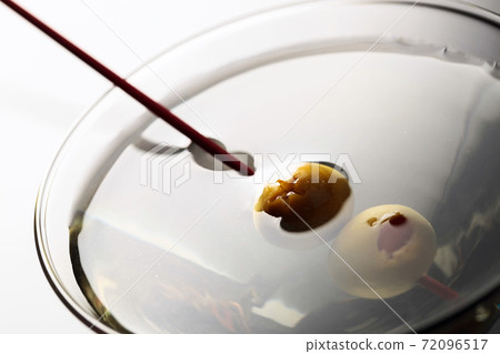 Dry martini with green olives. Dry martini with green olives. 72096517