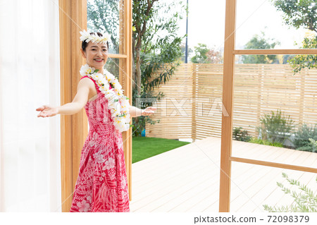 A woman making a hula dance A woman making a hula dance 72098379