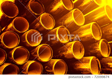 Black metal pipes and adapters of different diameters for gasification or water supply. Industrial background  72099674