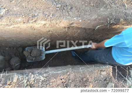 Work of excavating machine on building construction site Work of excavating machine on building construction site 72099877
