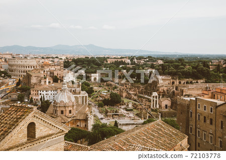 Panoramic view of city Rome with Roman forum and Colosseum from Vittoriano Panoramic view of city Rome with Roman forum and Colosseum from Vittoriano 72103778