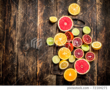Citrus background. Citrus fruits. 72104271