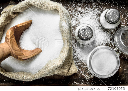 Salt in an old bag on a tray. Salt in an old bag on a tray. 72105053