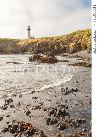 Yaquina Head Lighthouse at Pacific coast, USA 72106331