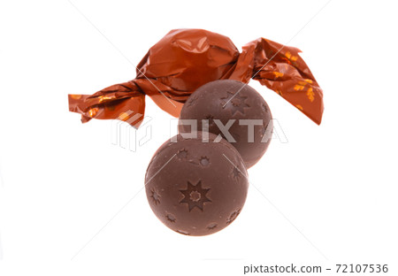 chocolate truffles isolated chocolate truffles isolated 72107536