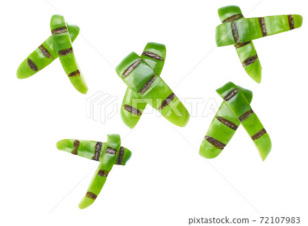 grilled sliced green bell pepper isolated on white background. Top view. 72107983