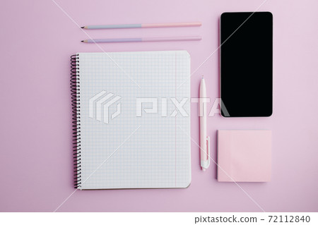 Woman workplace. Home office on pink background 72112840