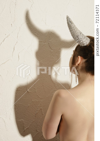 woman with horns 72114371