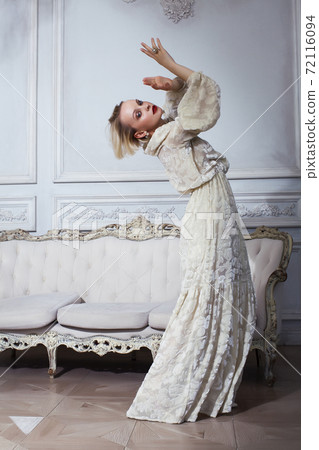 pretty blond woman in rich luxury house interior, fashion people concept pretty blond woman in rich luxury house interior, fashion people concept 72116094