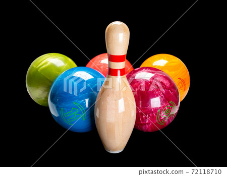 Wooden pin for bowling isolated on a black background. Bowling ball. 72118710