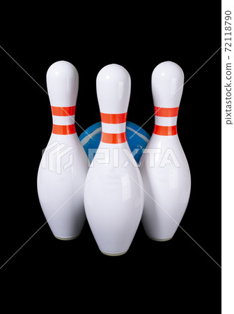 Bowling pins of white color isolated on black background 72118790